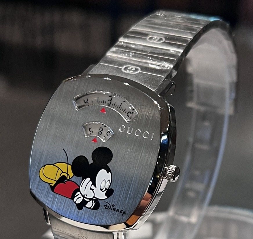 Gucci Silver Character Dial Watch